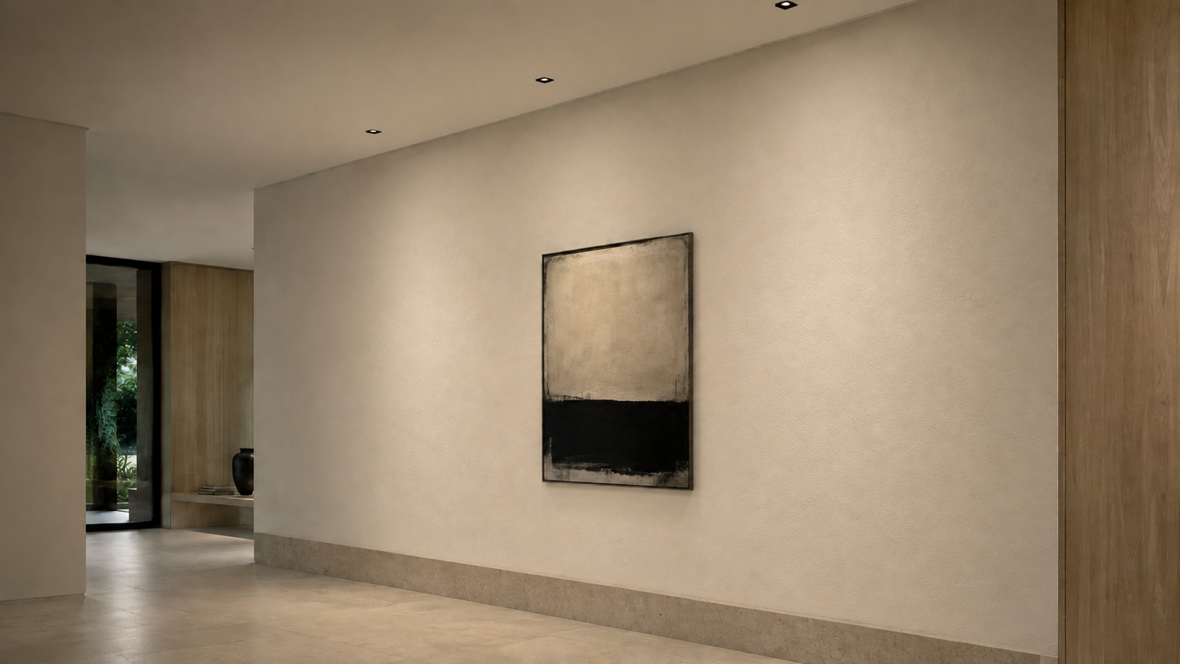 Three recessed wallwash luminaires producing an even warm-white wash across a textured interior wall